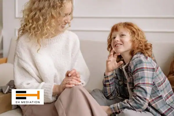 Happy mother and child after sorting child arrangements mediation Workington